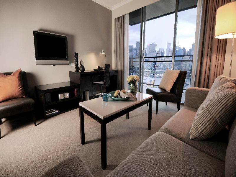 The Star Grand Hotel And Residences Sydney Bagian luar foto A living room in a serviced apartment in Singapore